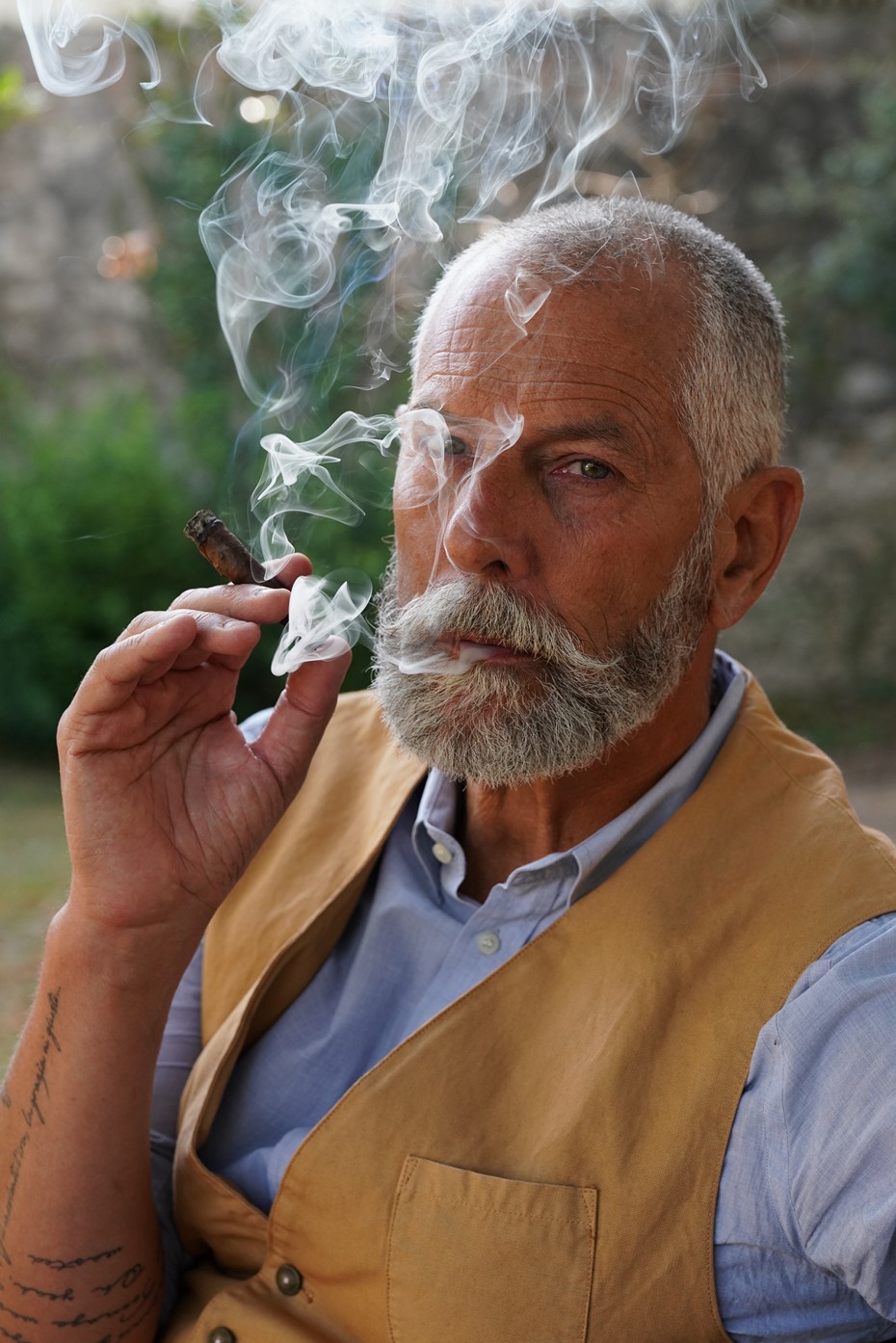 Smoking Toscano cigar, Mr. Roberto Giomi, Catador of Cigar Club Association, Lucca, Tuscany, Italy.